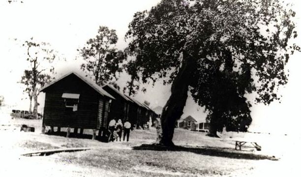 Twelve huts on foreshore on Bribie Island