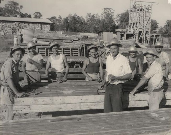 8 workers working on mill construction (Outdoor)