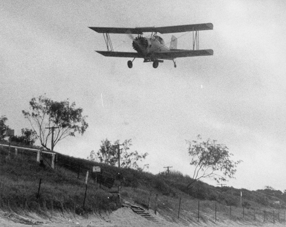 Fertilising the sand dunes at Woorim to encourage vegetation in 1982