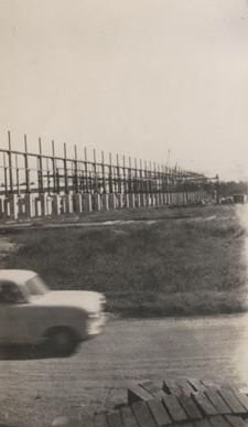 Mill construction - Car passing in foreground