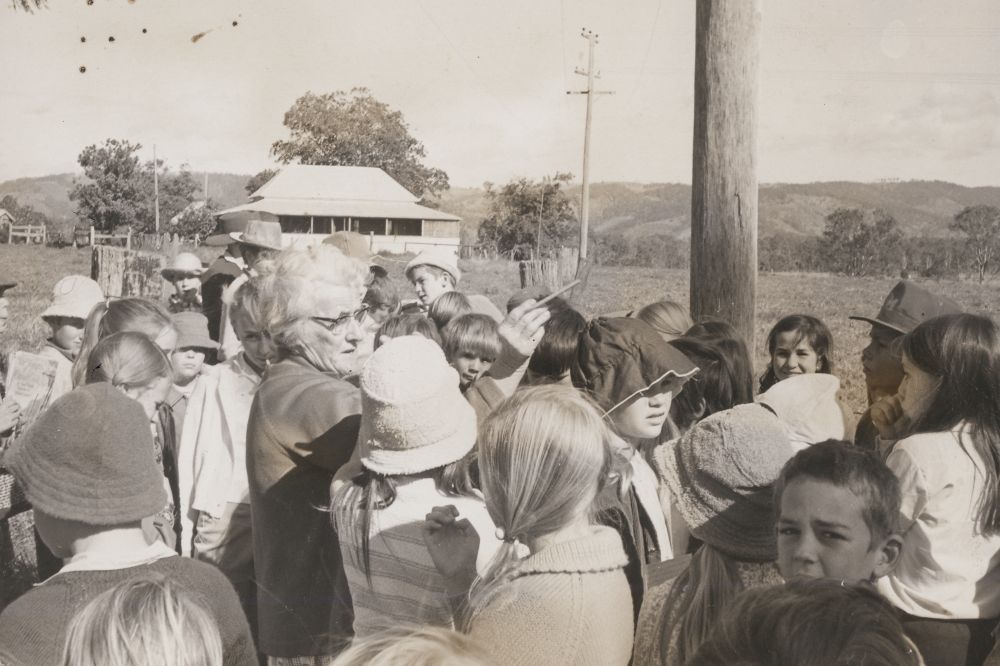 Mrs Esme Sampson with Caboolture State School students