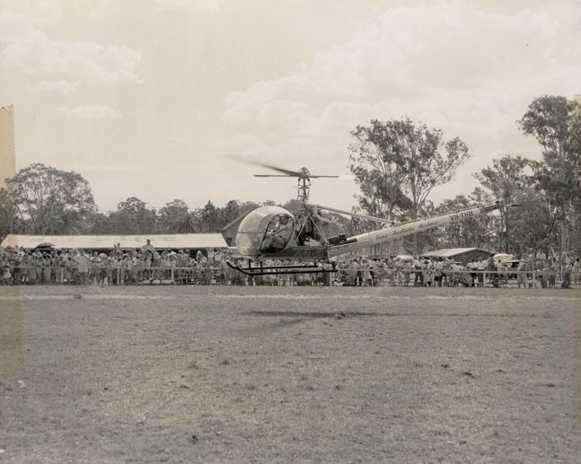 Christmas Party 1958 - Santa arriving in TAA Helicopter