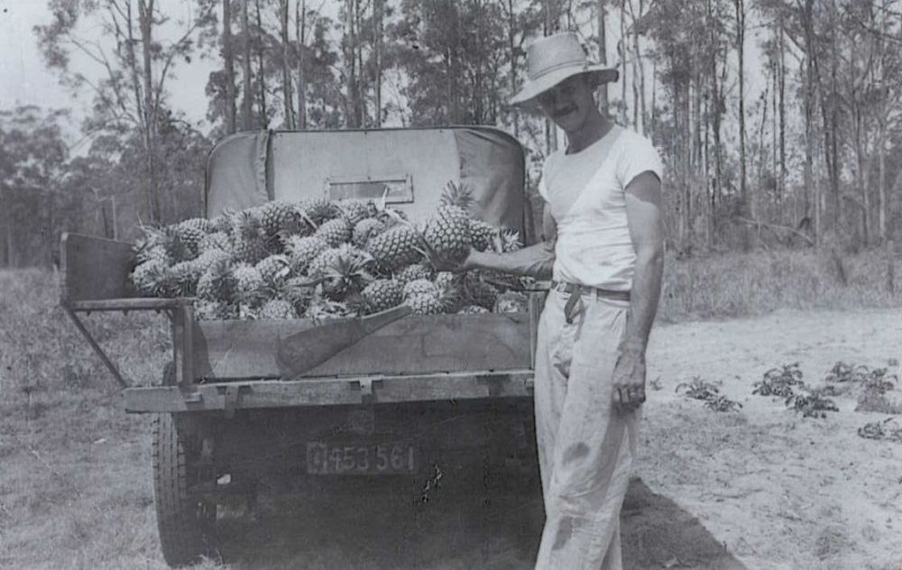 Frederick Gillette with his truck loaded with pineapples
