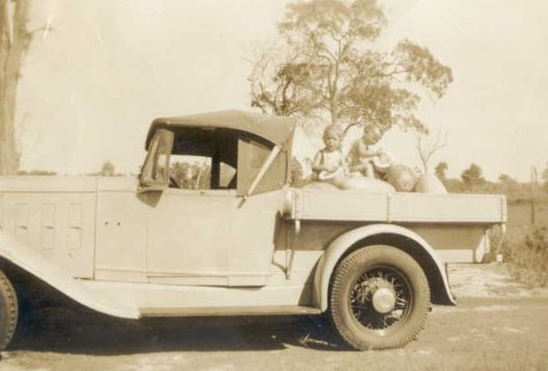 Joan and Carole Lehman with a truckload of watermelons from their parents' farm in the 1940s