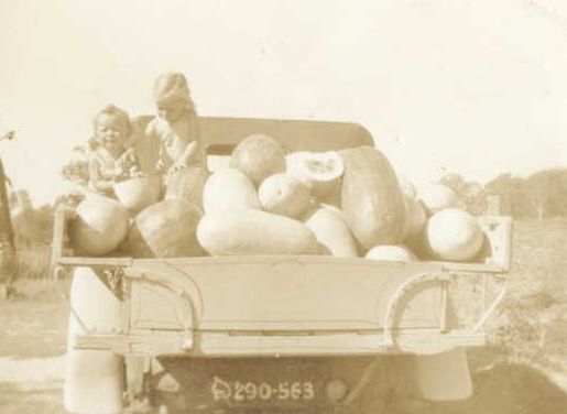 Joan and Carole Lehman with a truckload of watermelons from their parents' farm in the 1940s