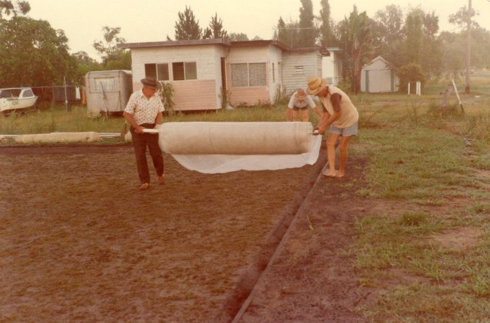 Rolling the nets out for the bowling green during construction of the Donnybrook Bowls Club