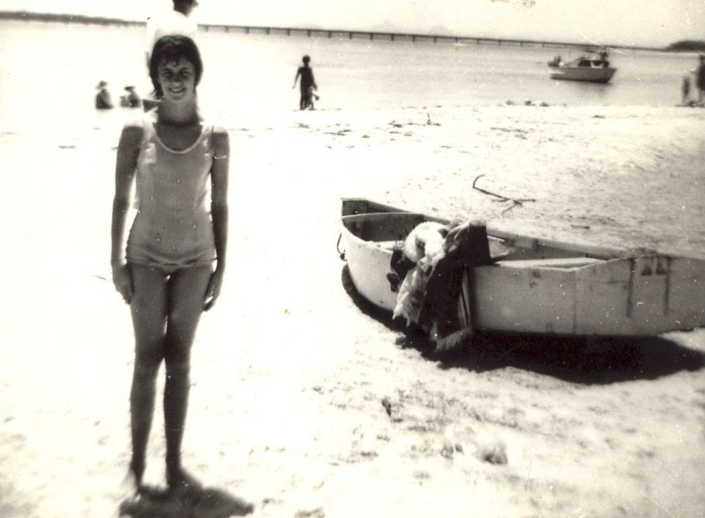 Lyn Best standing on beach on Bribie Island