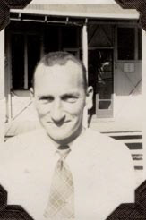 Unknown Male Staff Member in front of office