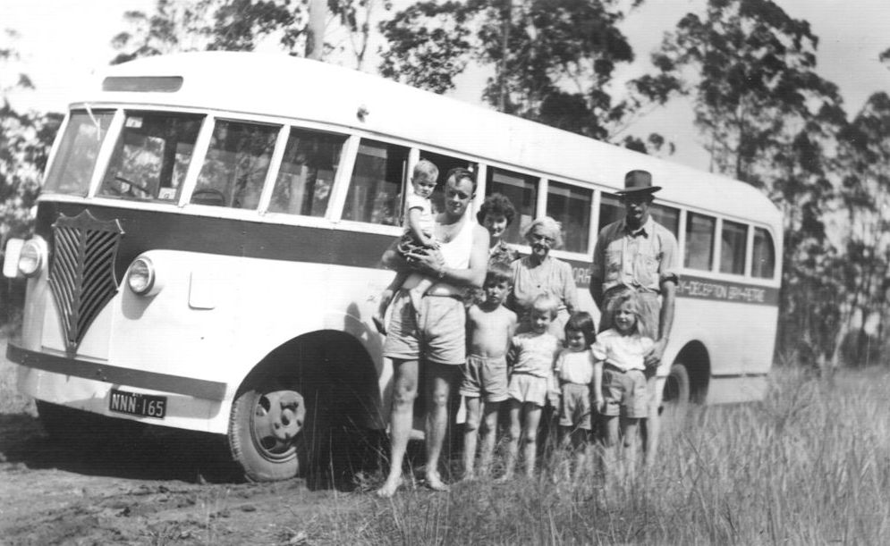 Standing at the side of one of Frank McLoughlin's buses in 1961