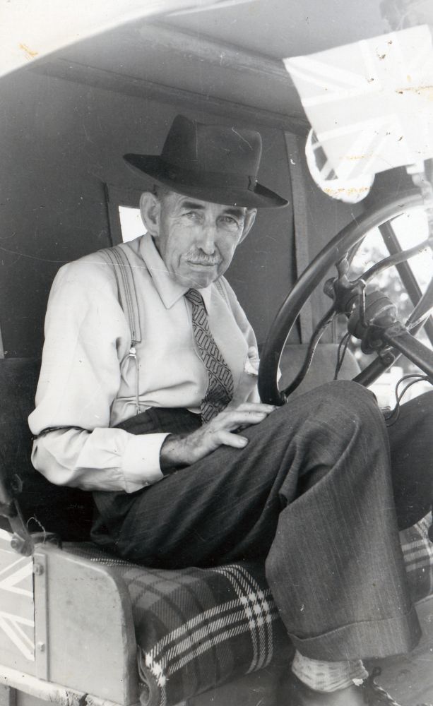 Charles (Charlie) Rutter sitting in his Model T Ford, ca. 1950s