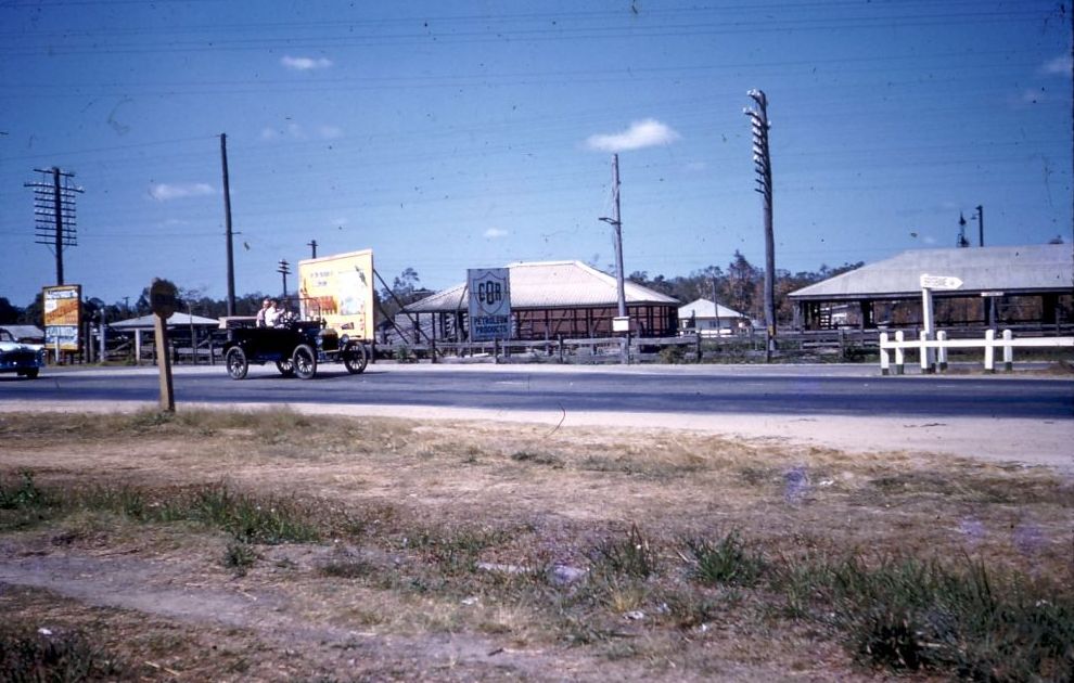 Vintage cars passing through Caboolture, 1960