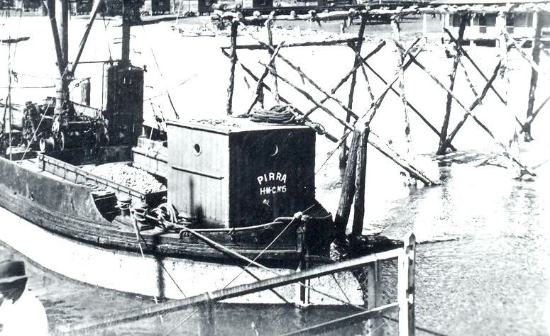 A barge carrying road metal to be used in construction of Ocean Beach Road Bribie Island