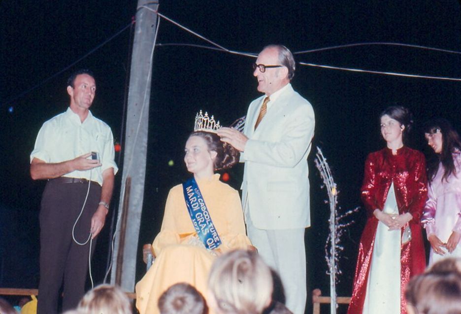 Mr D.E. (Dave) Nicholson, Member for Murrumba, crowning the Mardi Gras Queen