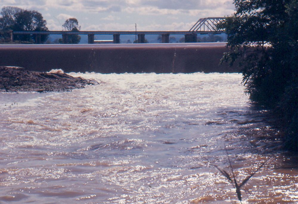 Caboolture River weir in flood on 1 November 1976