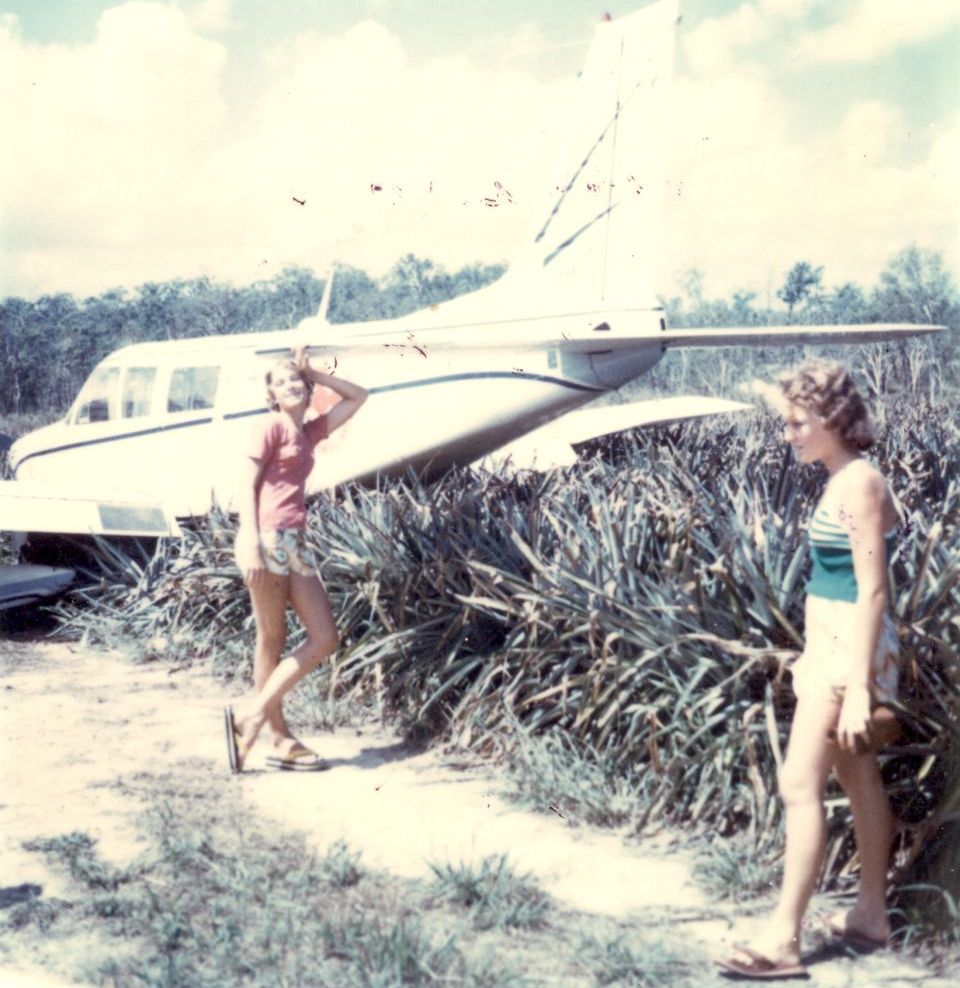 Robyn and Christine Gynther with a plane