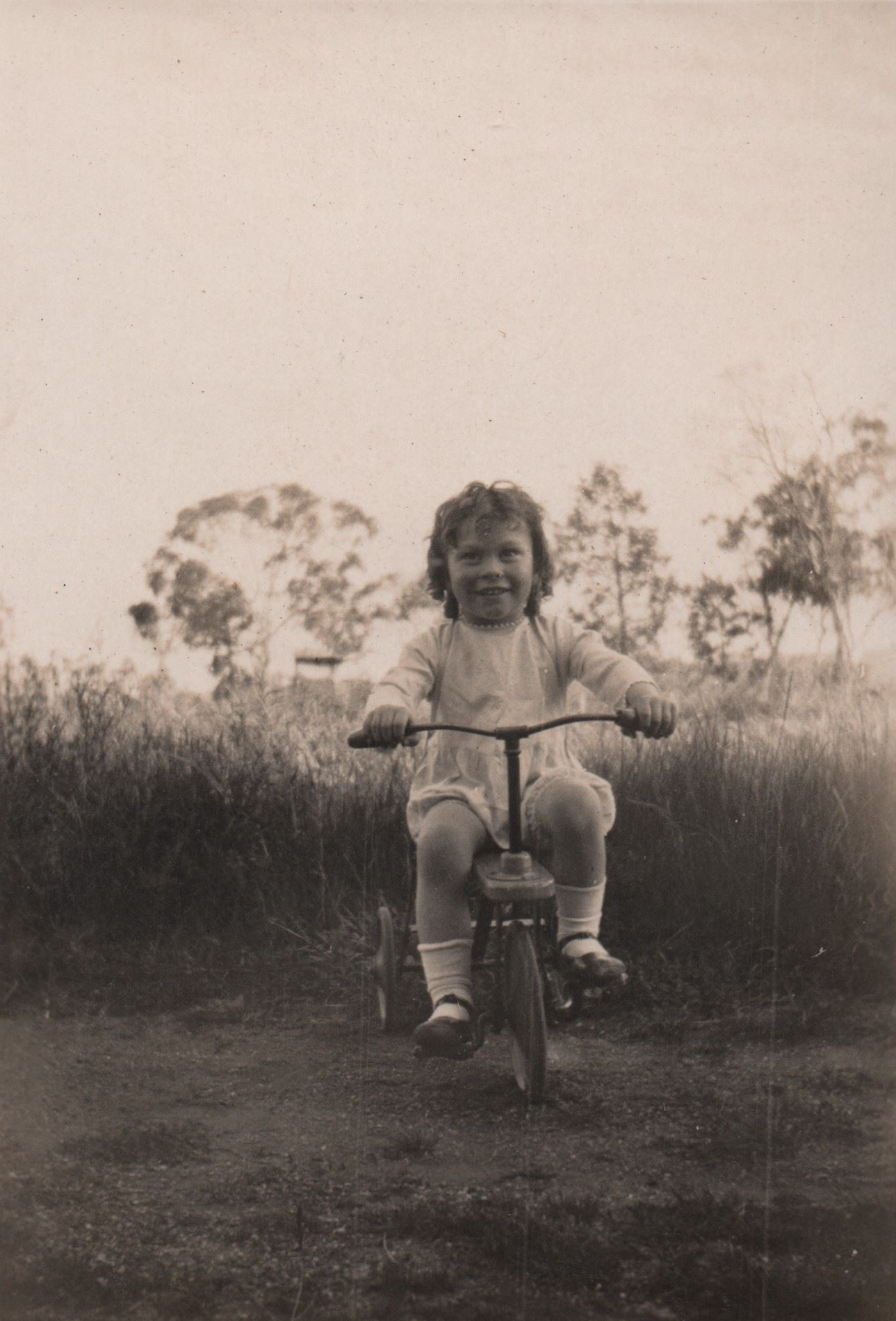 Small Girl on Tricycle