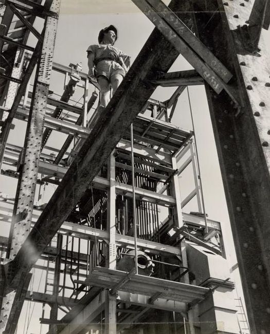 Male Worker walking on steel girder