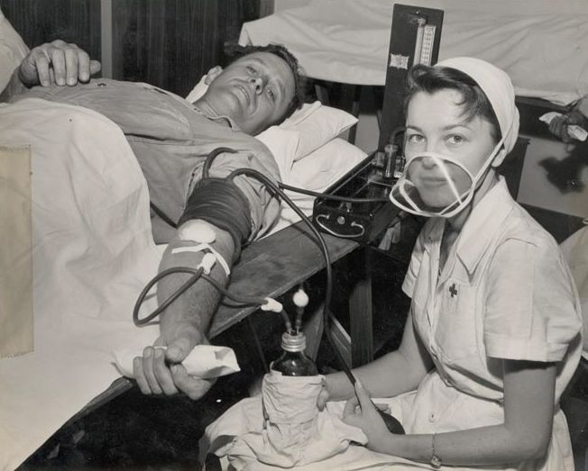 Worker giving blood