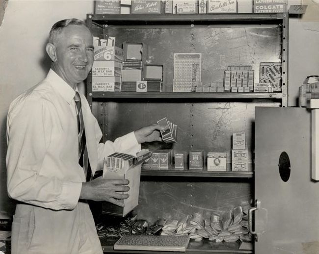 Charley Langley stocking the shelves