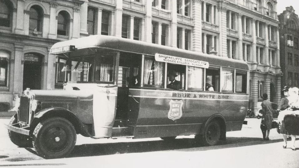 Blue and White Line Bus