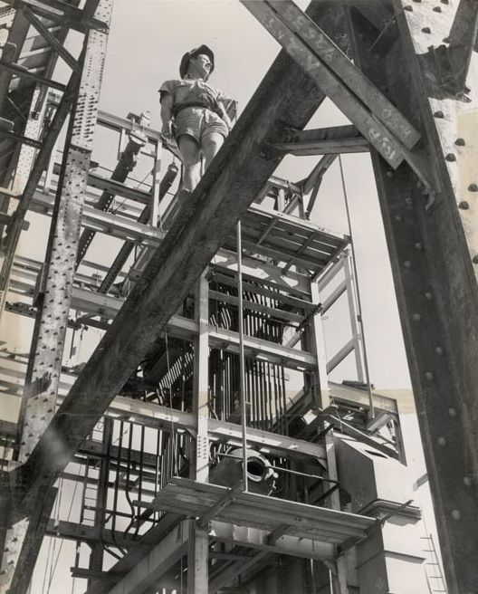 Worker walking on steel girder