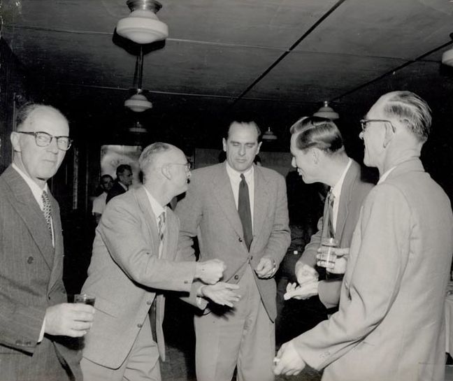 5 Men in suits talking