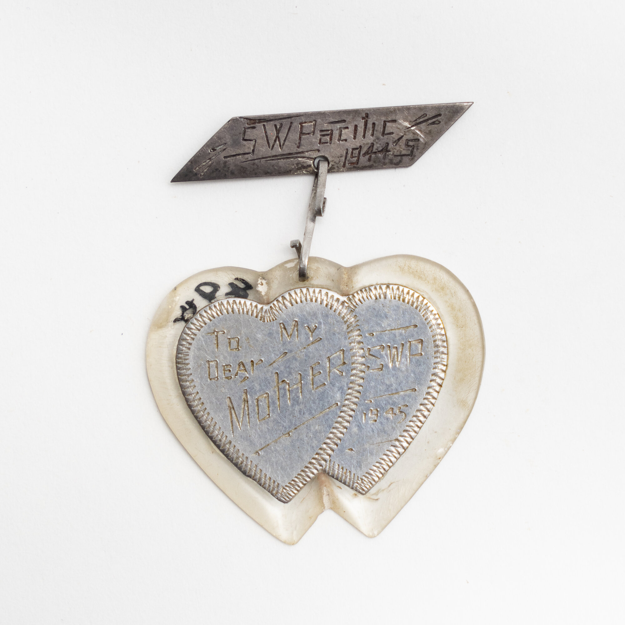 Trench art - brooch - aluminium and perspex