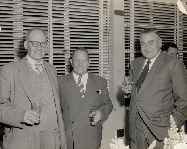 3 Men enjoying a drink