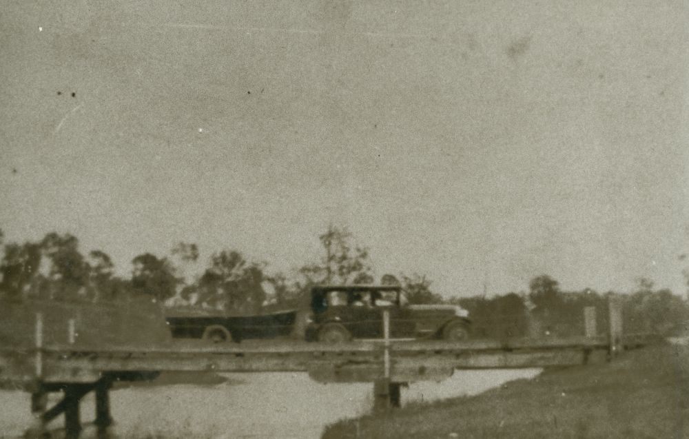 Crossing the old North Pine River bridge, ca. 1930