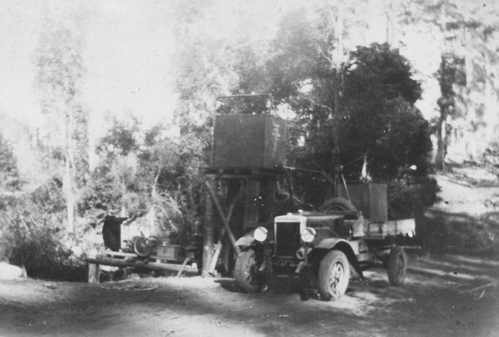 Water tanker filling up from a pump at Mount Mee, ca. 1930