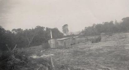 Old shack with APM written on it