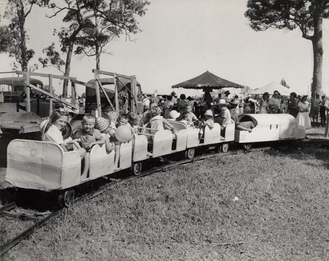 Children enjoying model train ride