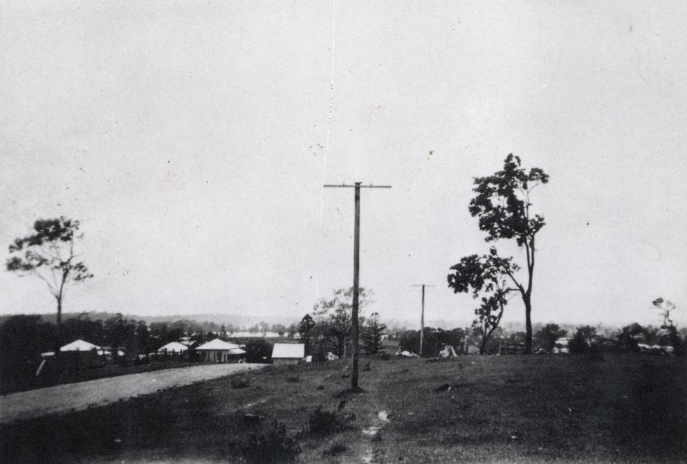 View of Petrie with flood waters in the background, ca. 1929