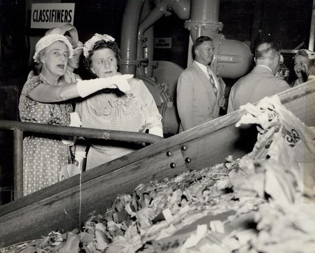 Dignitaries being taken on a tour of the Mill