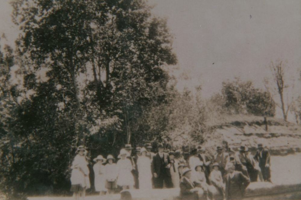 Large group of people at Quinn's Bridge in the 1920s