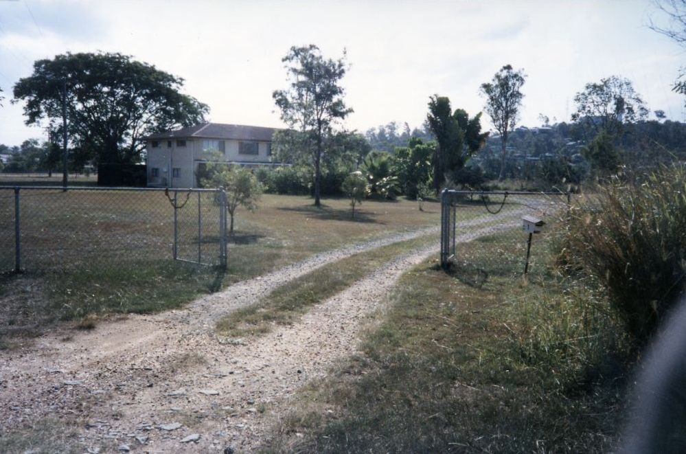Unknown house with Eatons Hill in the background