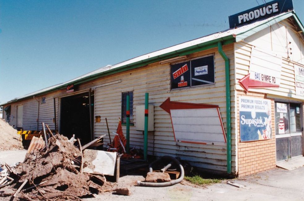 Side view of the Pine Rivers Produce and Saddlery store, Gympie Road Lawnton, early 1980s