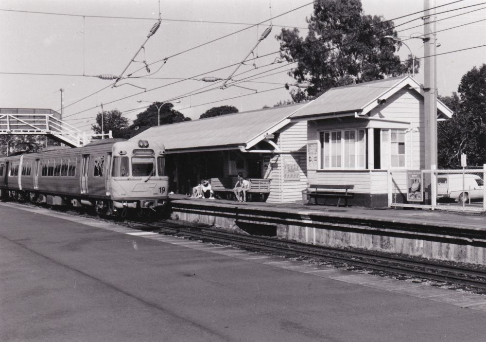 Electric train passing through Petrie Railway Station, 1988