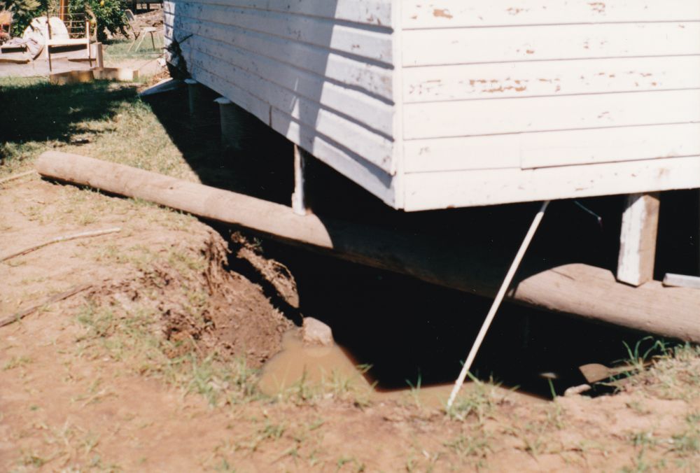 Foundations to a house washed away during floods in Charleville (Qld.), 1990