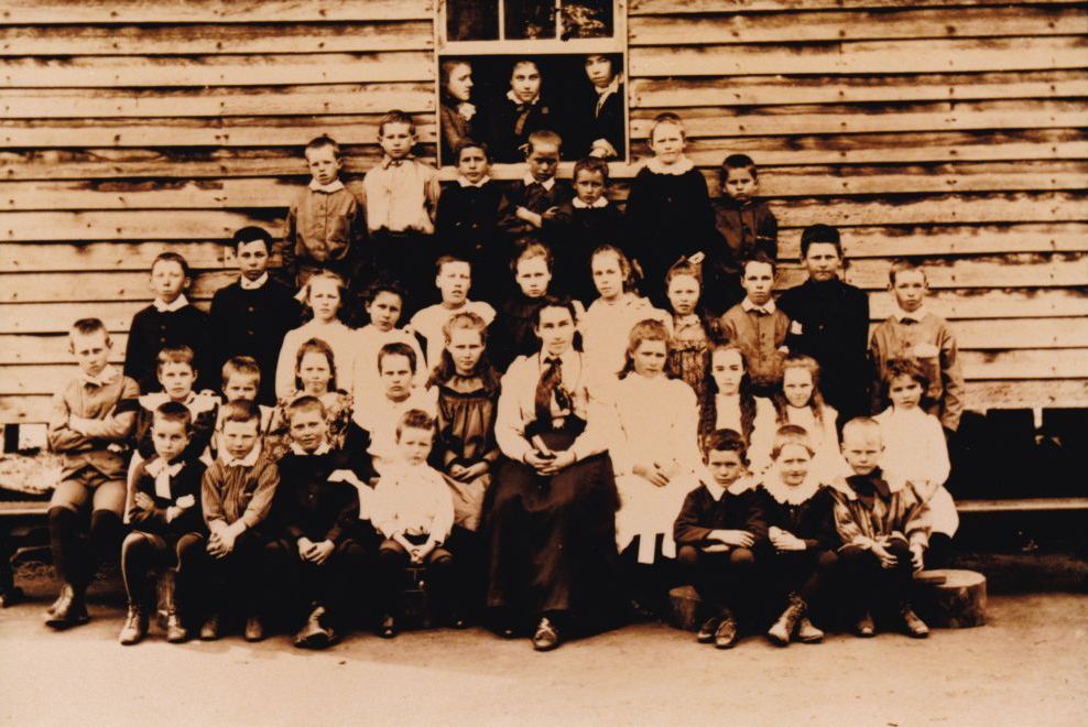 Group of school children with their teacher