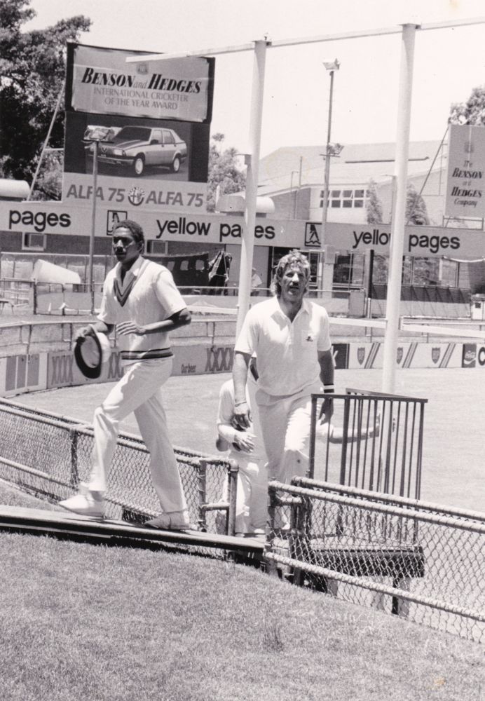 Ian Botham (England cricketer) and other cricketers, ca. late 1980s