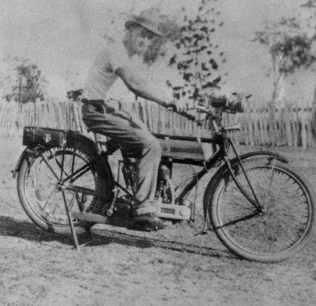 Joseph Coulthard riding a Douglas motorcycle, ca. 1930