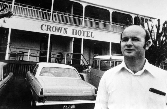 Michael Cruice standing in front of the Crown Hotel, Dayboro, 1980s