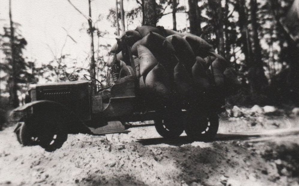 Truck loaded with horse feed for the horse teams, 1930