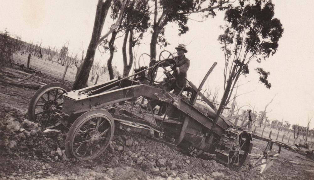 Man driving grader, ca. 1930