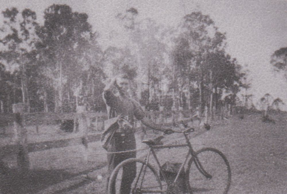George Hermann with his bicycle, late 1920s