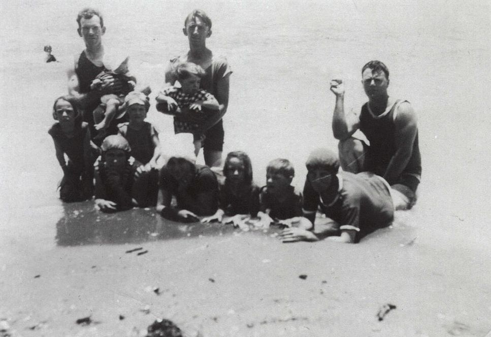 Family at water's edge