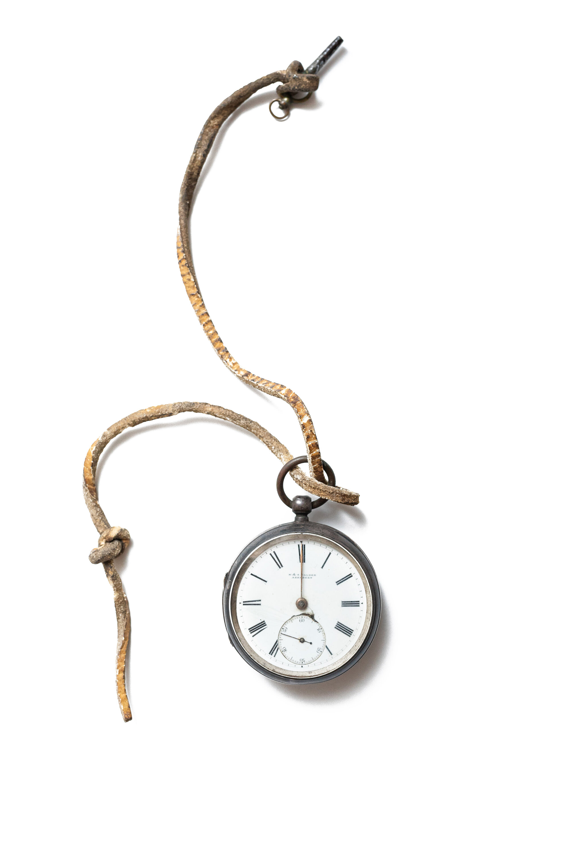 Open face pocket watch and key