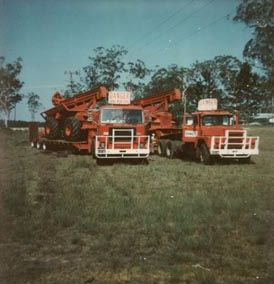Forestry - Machinery on the back of two low loader trucks