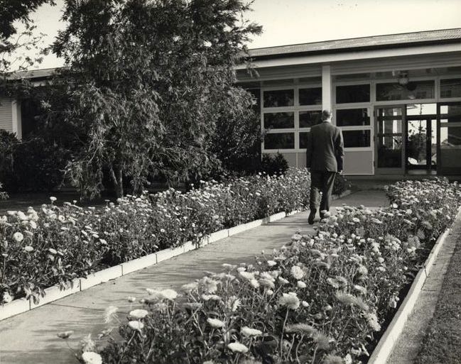 John King walking up a pathway